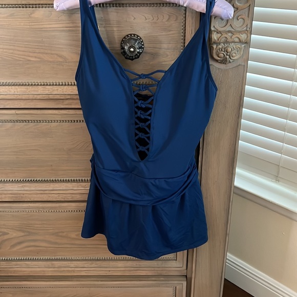 Two swim dresses. Blue is NWT, gray was barely used. Size 8 - Picture 4 of 9